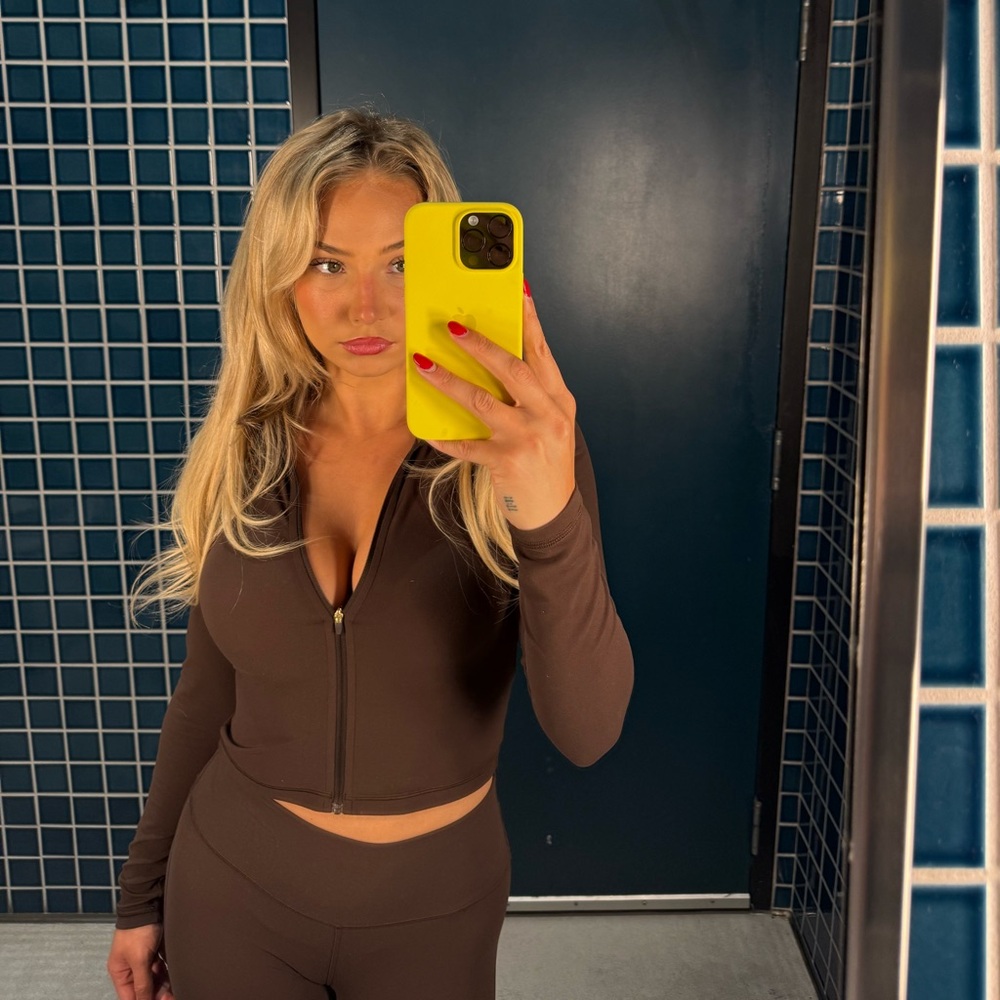 Aritzia two piece Brown butter limit zip up & cheeky infinite flare leggings